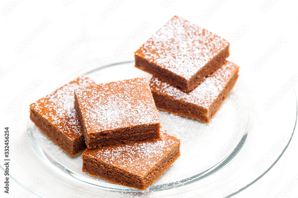 gingerbread  cubes with sugar on the plate
