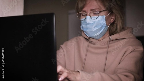 Senior white woman working from home during pandemic photo