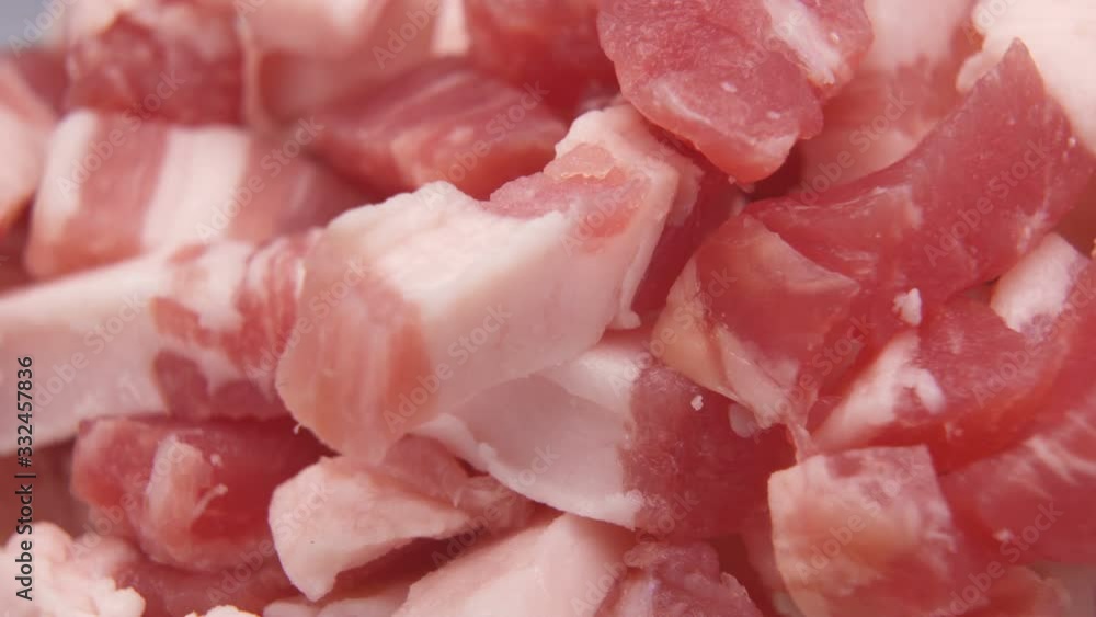 Macro shot of juicy cubes and pieces of pork meat Macro shot of juicy cubes and pieces of pork meat