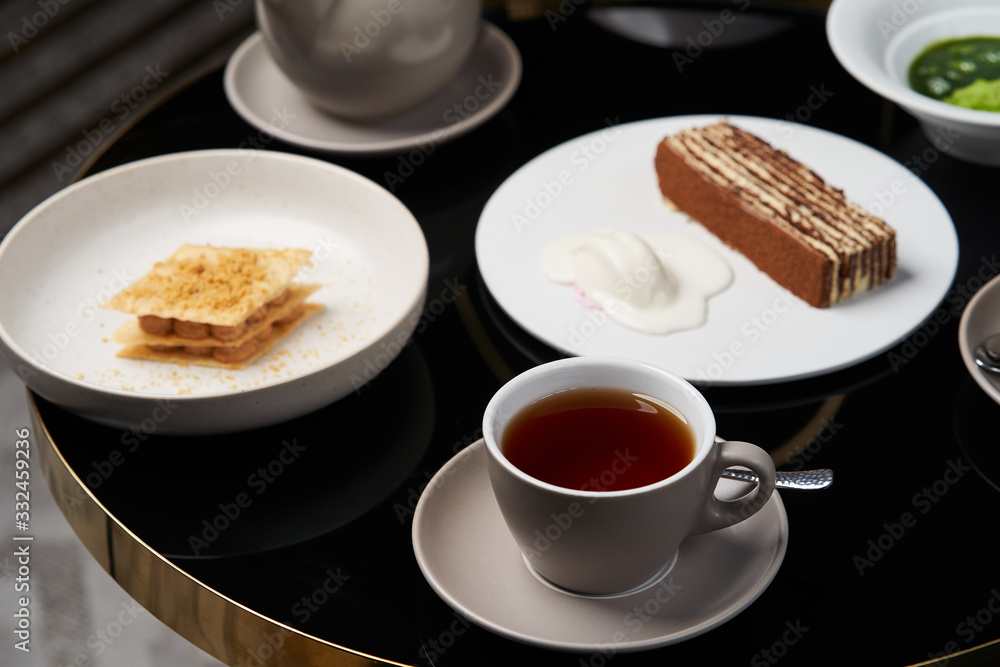 Traditional tea ceremony. Sweets dessert cookies cake and teapot Traditional tea ceremony. Sweets dessert cookies cake and teapot