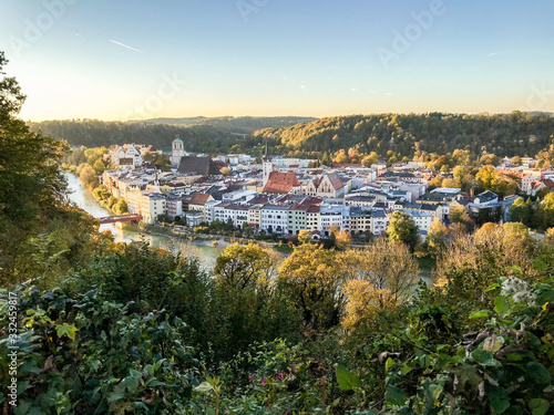 View from the mountains over Wasserburg city and Inn river at sunset photo