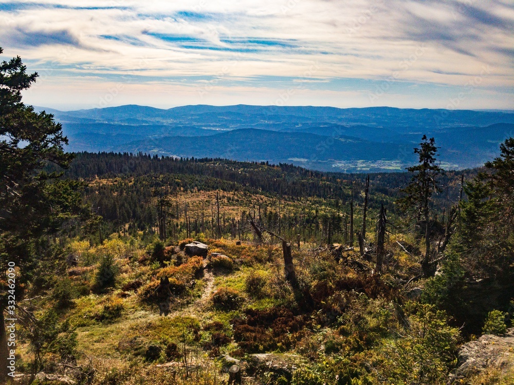 Fototapeta premium View at the mountains from Kleiner Arber at Bavarian Forest; Cloudy sceneric sky