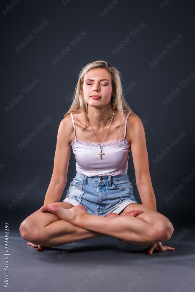 A girl doing yoga and various practices relaxes after a busy day A girl doing yoga and various practices relaxes after a busy day