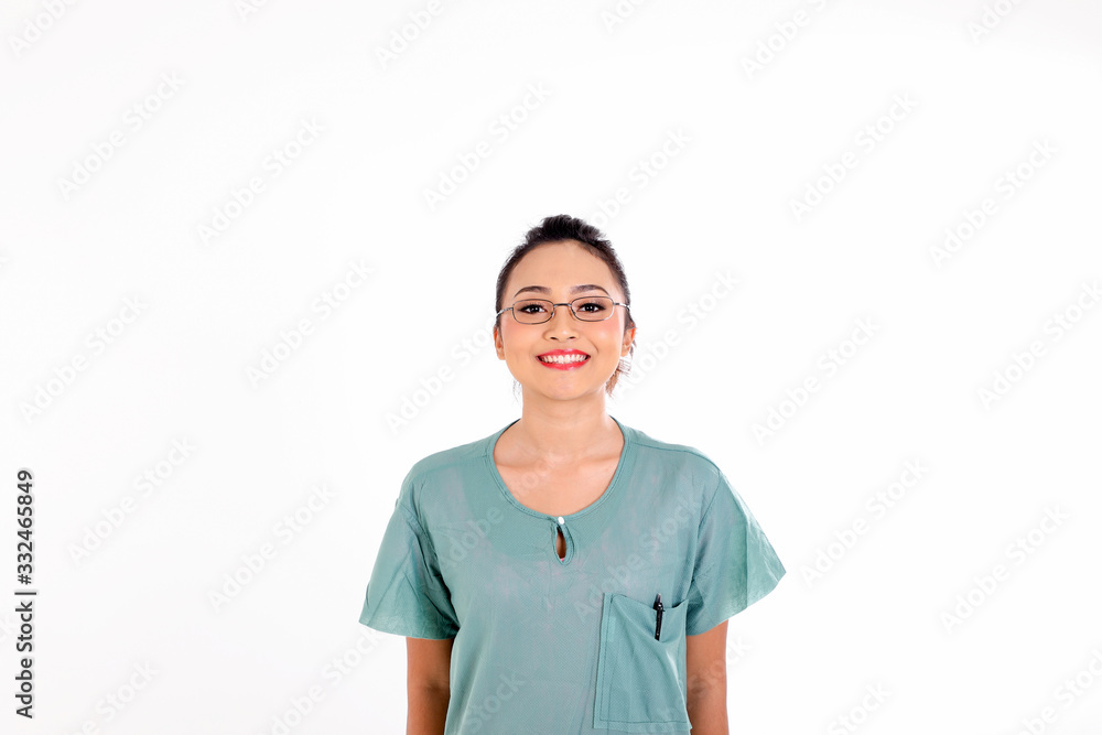 Young asian malay female doctor waring green scrub uniform happy smile look at camera on white background Young asian malay female doctor waring green scrub uniform happy smile look at camera on white background