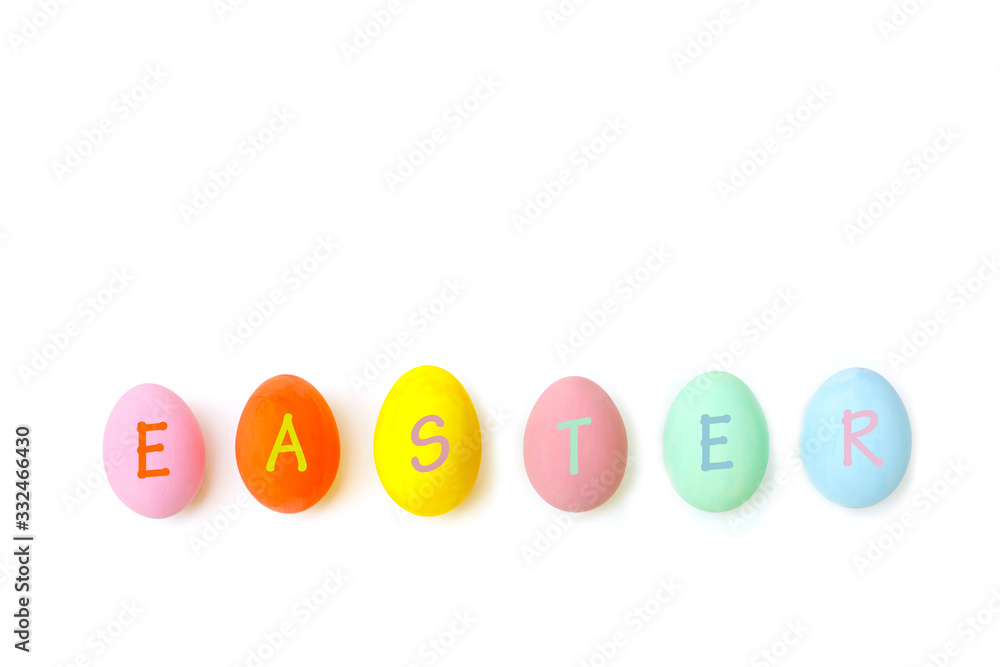 Perfect colorful handmade easter eggs with the letter EASTER isolated on a white background. Easter day concepts. Funny decoration. Happy Easter.