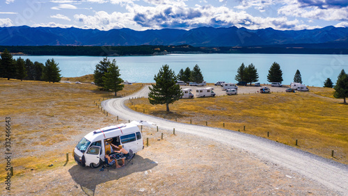 Camping in beautiful mountain lake Tekapo, New ZEaland photo