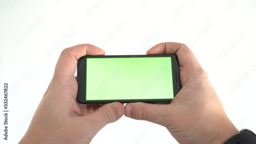 Watching a video on a mobile phone concept Watching a video on a mobile phone concept