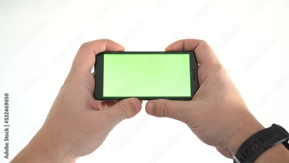 Watching a video on a mobile phone concept Watching a video on a mobile phone concept