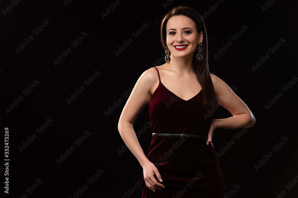 smiling woman in dress looking at camera isolated on black smiling woman in dress looking at camera isolated on black