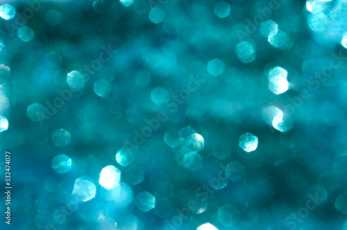 Turquise blue blur, glitter bokeh, abstract background shiny colors.
