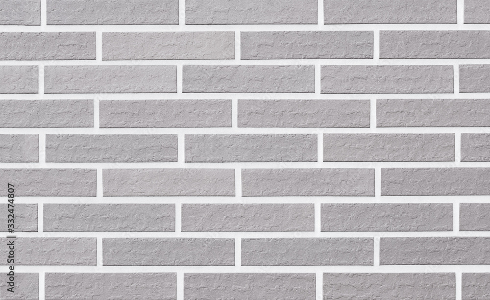 Naklejka premium Background texture of light grey brick wall