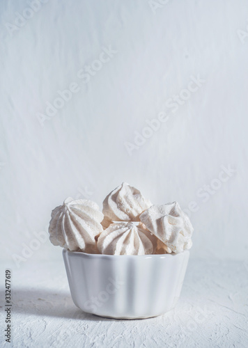 white meringues on a white background