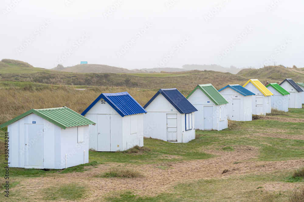 Gouville, France - 12 30 2018: Colorful bathing cabins of Gouville