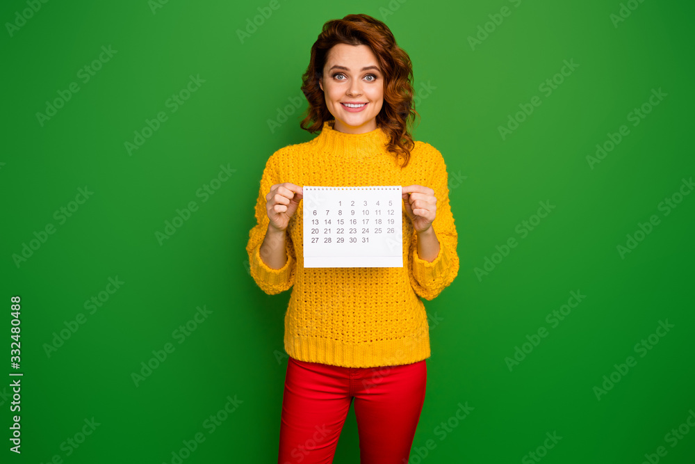 I'm pretty free. Photo of pretty cheerful lady hold paper calendar showing month without plans wear yellow knitted sweater red pants isolated green color background I'm pretty free. Photo of pretty cheerful lady hold paper calendar showing month without plans wear yellow knitted sweater red pants isolated green color background