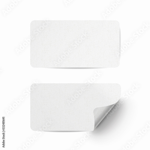 Vector white realistic paper adhesive stickers with curved corner and grain texture on transparent background.