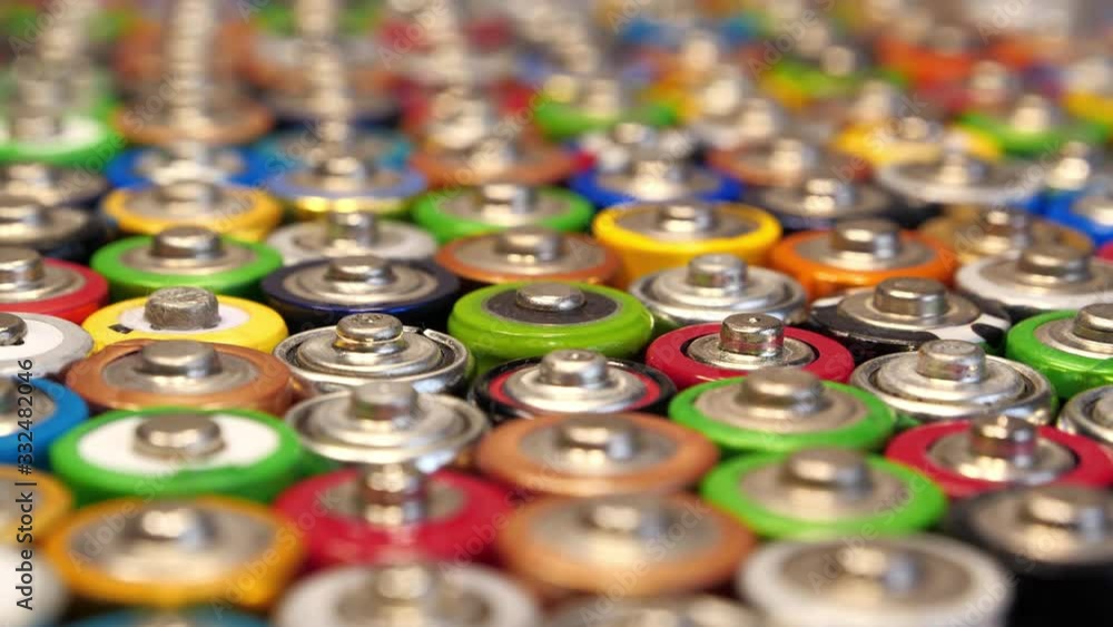 Many multicolored used batteries Many multicolored used batteries