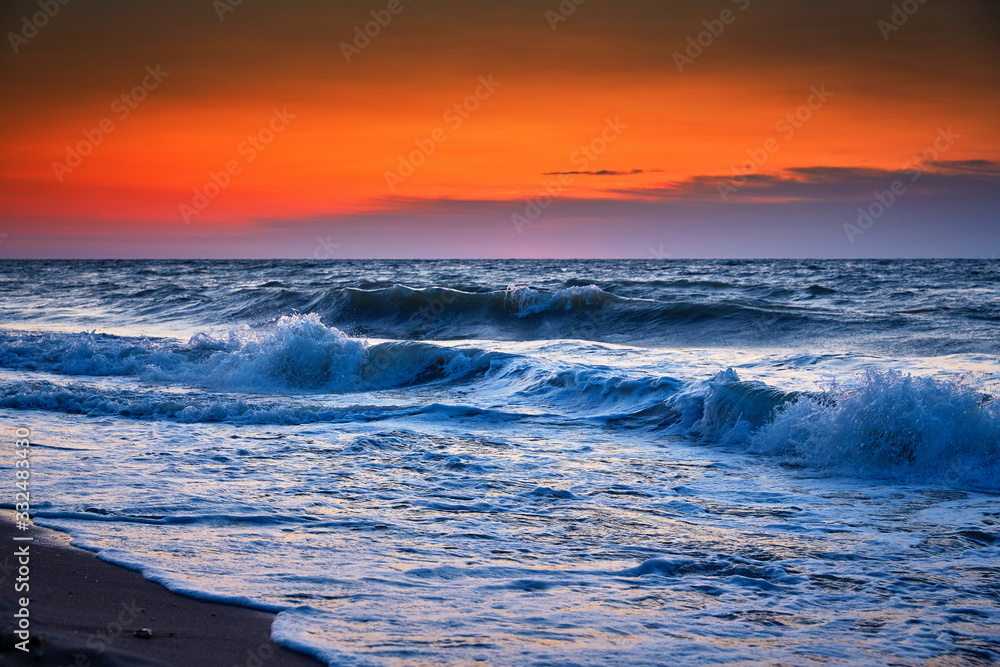 Sea waves and Beautiful dawn sunrise at sea. Seascape.