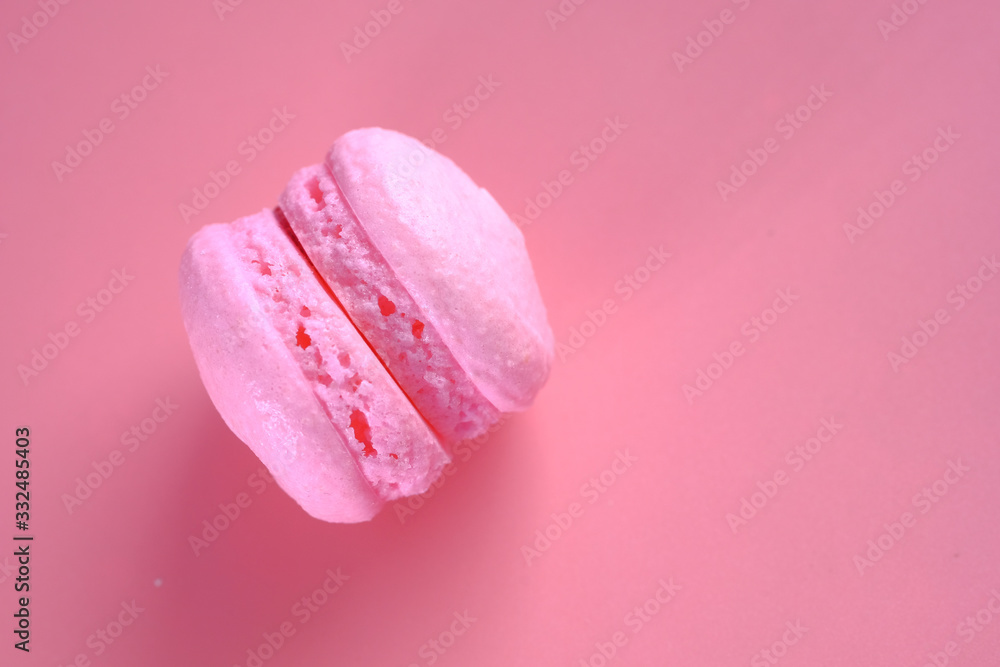Close up of pink color macaroon on pink Close up of pink color macaroon on pink