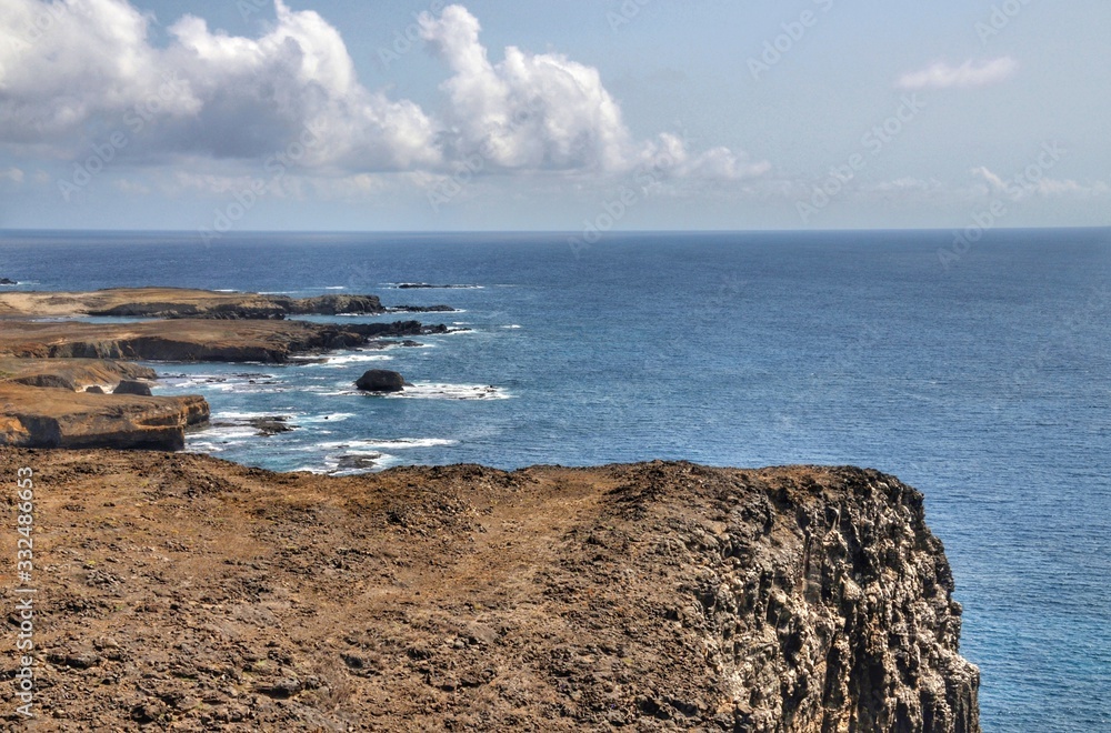 The dry rugged coastline of Djeu, an islet in the Atlantic ocean, part of the Cape Verde Islands
