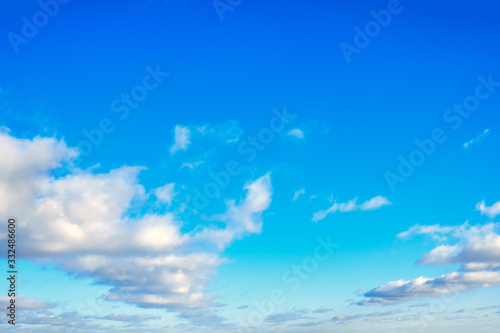 Clouds in the blue sky  background. Copy space for text  white clouds during the day