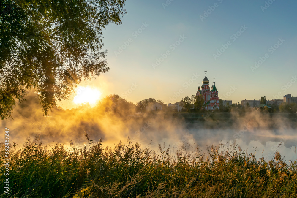 Fototapeta premium landscape with a church at sunrise