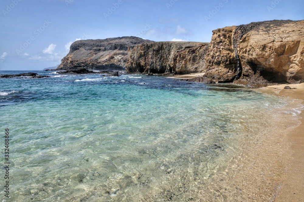 Clear water by the cliff in Djeu, an islet on the archipelago of Cabo Verde