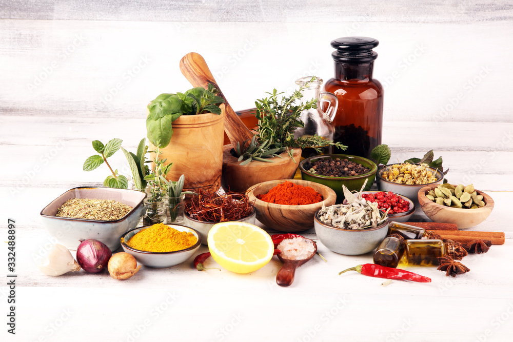 Spices and herbs on table. Food and cuisine ingredients with pepper Spices and herbs on table. Food and cuisine ingredients with pepper