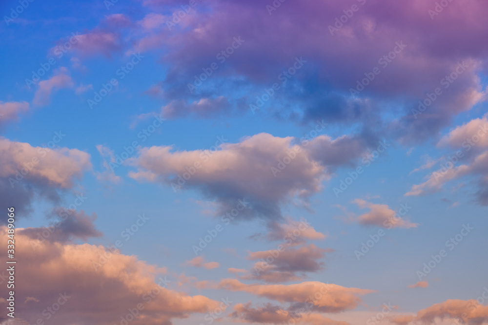 Red clouds on the background of the evening sky, save the space for the inscription