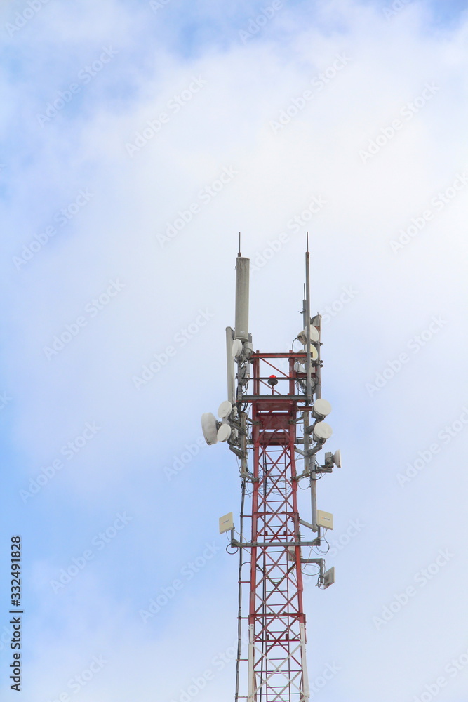 Base station mobile network antenna on a steel structure mast with a repeater. Base station mobile network antenna on a steel structure mast with a repeater.