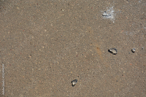 broken glass fragments on asphalt. Background