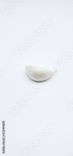 Garlic cloves are isolated on a white background.