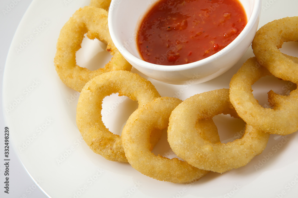 Appetizing Thick Cut Onion Rings isolated on white background