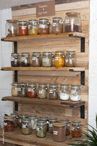 Jars of herbs and spices inside a UK zero waste shop