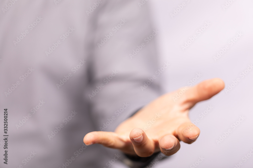 Fototapeta premium Businessman without head holding something without theme