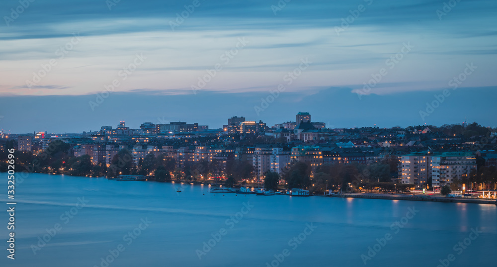 Beautiful landscape photo of Stockholm cityscape viewed from Skinnarviksberget on early evening in autumn. Beautiful Stockholm evening panorama from famous vantage point.