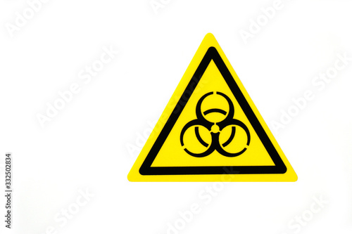 yellow biohazard warning sign with white background