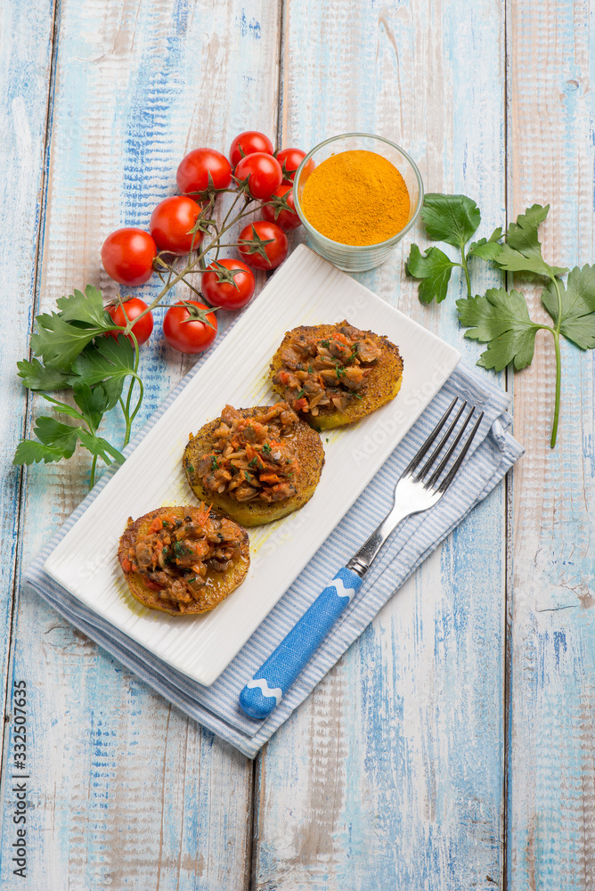 canapes with clam with tomatoes sauce and turmeric spice canapes with clam with tomatoes sauce and turmeric spice