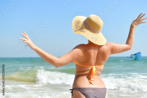 The woman on the beach. Vacation on the ocean © Victoria