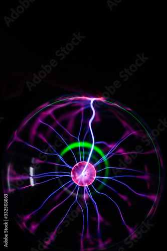 Light streams of light in luminous ball in dark