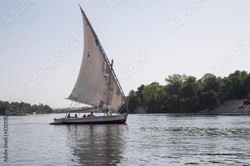 Feluccas on the Nile river in aswan Egypt on a hot day