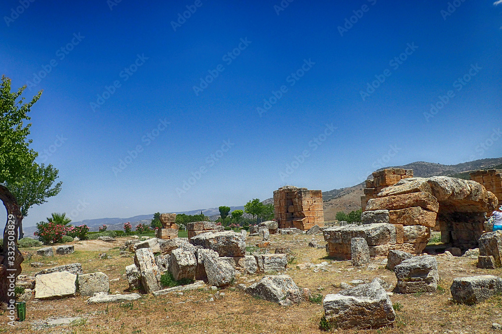  old ruins of the Roman spa city of Hierapolis on the site of the current poison on a warm summer sunny day