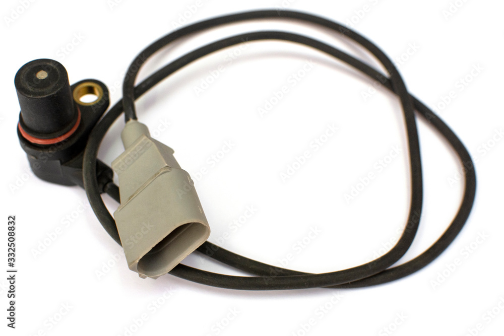 Car wheel speed sensor isolated on while background. Spare parts. Stock  Photo