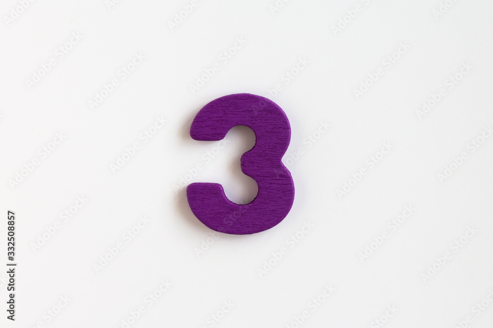 violet painted wooden number three, craft sign for kid's education isolated, ecological concept violet painted wooden number three, craft sign for kid's education isolated, ecological concept