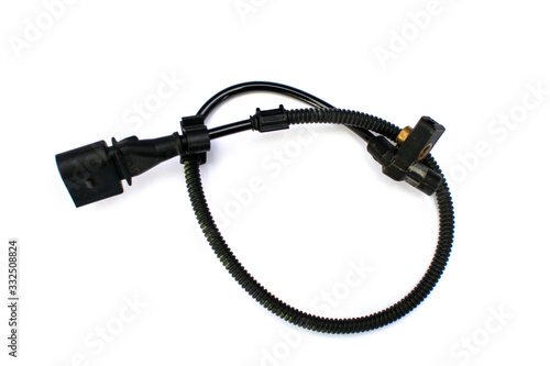 Car crankshaft position sensor on an isolated white background. Spare parts.