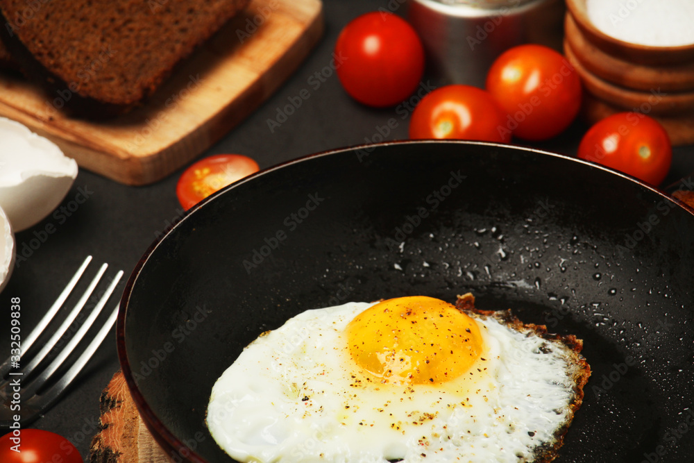 Fried egg with tomatoes and bread Fried egg with tomatoes and bread