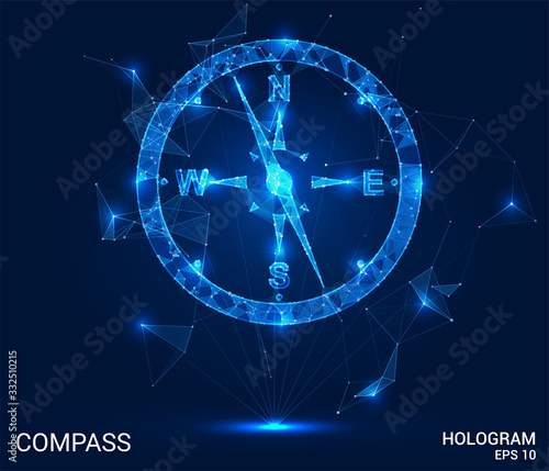 A hologram compass. A compass of polygons, triangles , points, and lines. Compass is a low-poly compound structure. The technology concept.
