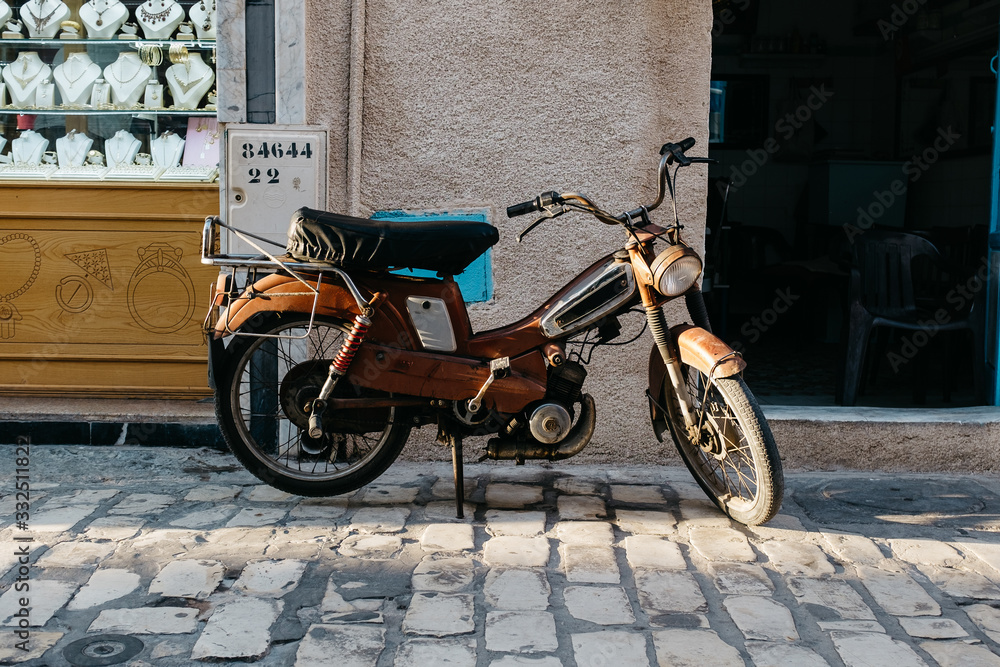 Old motorbike in arabic city 
