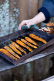 chop carrots and bake on a baking sheet in the fresh air in autumn