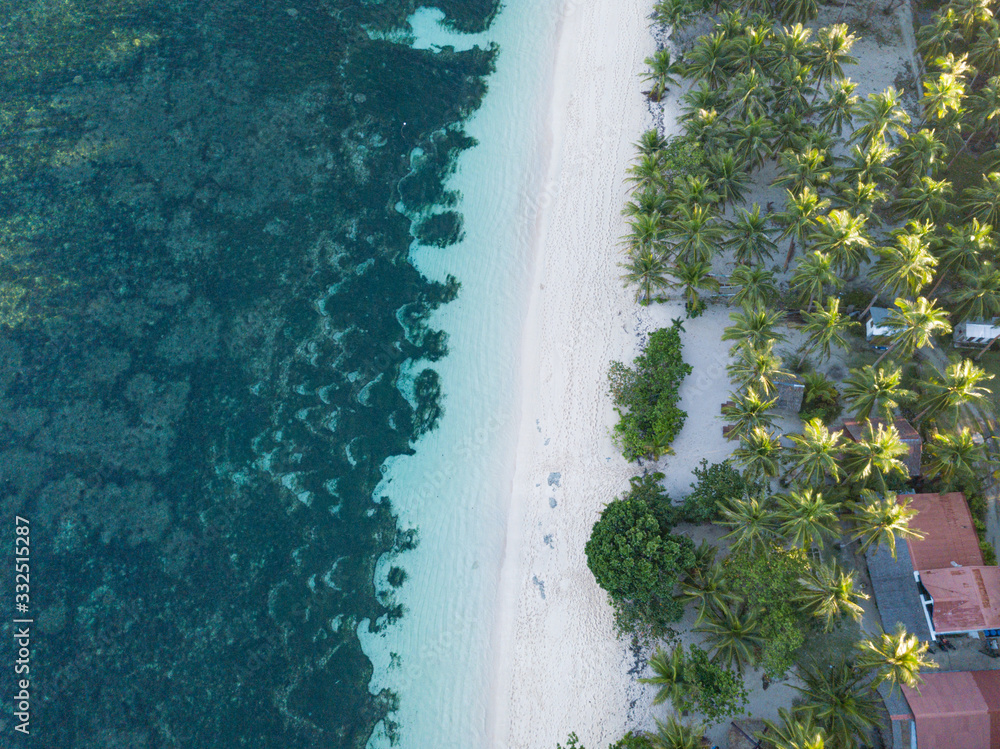 Aerial top down view of Algeria Beach on a tropical paradise island of Siargao, Philippines
