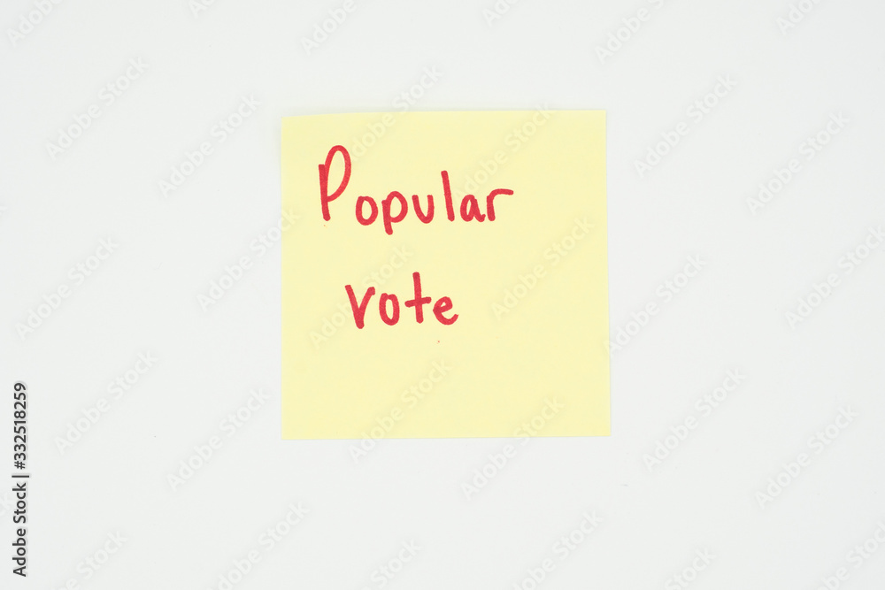Popular vote written on a yellow sticky note with copyspace. Presidential election 2020 Popular vote written on a yellow sticky note with copyspace. Presidential election 2020